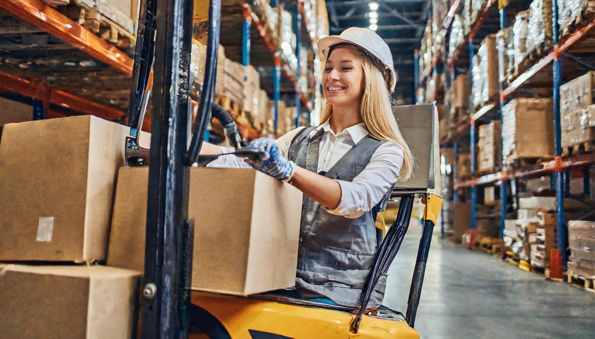 Firefly A worker operating a forklift with boxes in a warehouse 93529